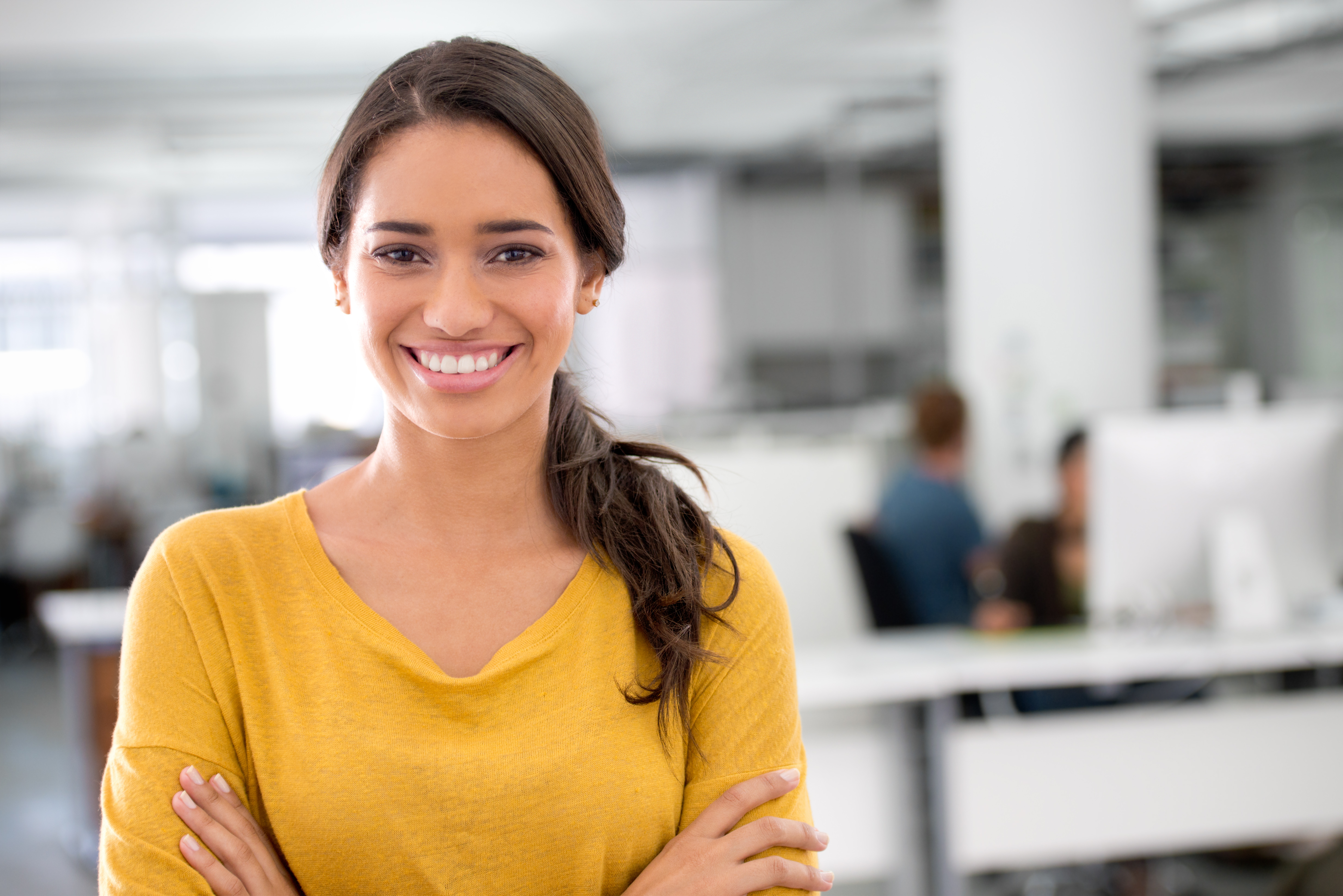 Women standing in office